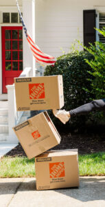 Owner kicking cardboard boxes